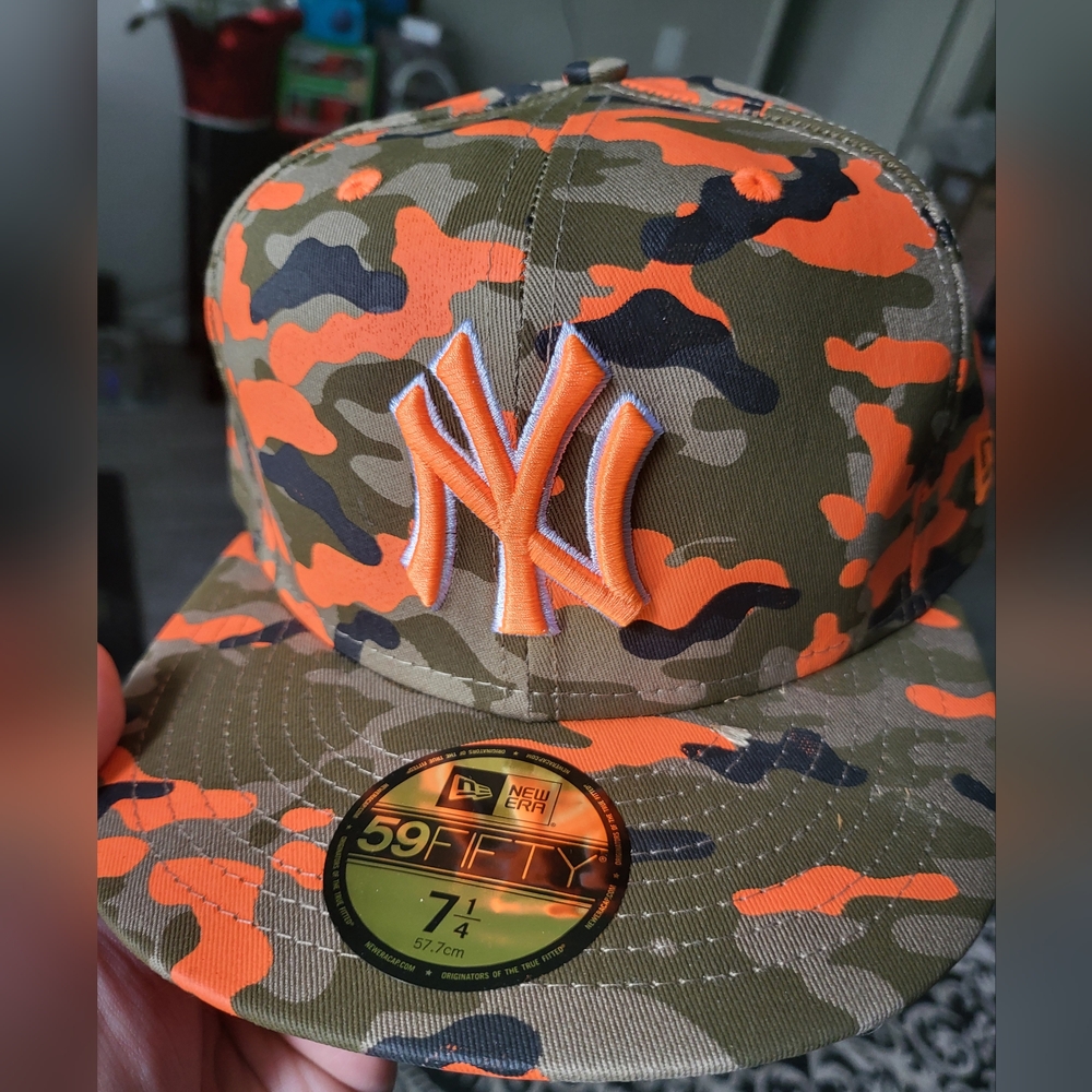 New Era Camouflage Cap with Orange Logo